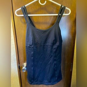 Lululemon cami with built in bra fits as a large, size 6.